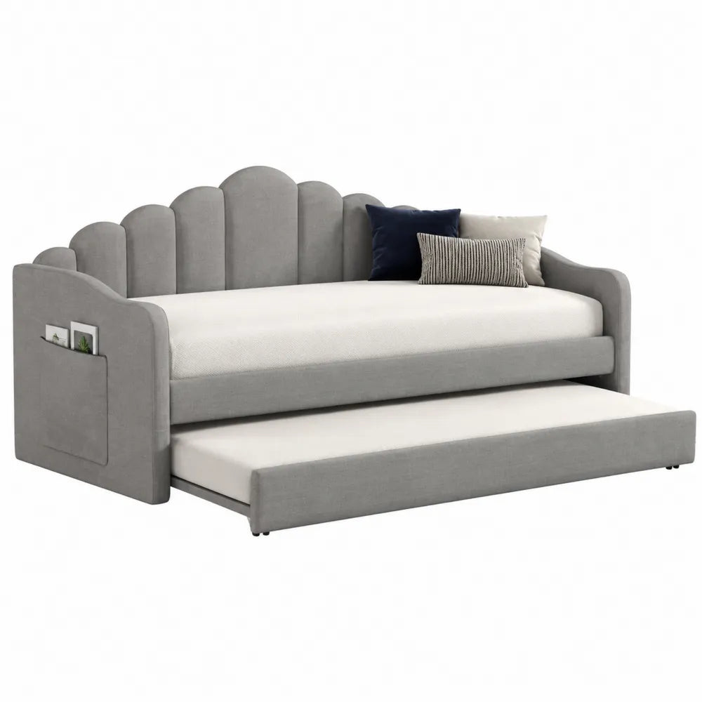 Letto singolo imbottito in tessuto grigio con letto estraibile 90 x 200 cm struttura in legno e rete a doghe con testiera ondulata